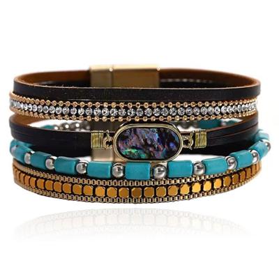 Deja Boho Armband goudkleurig met turquoise kralen en natuursteen in zwart