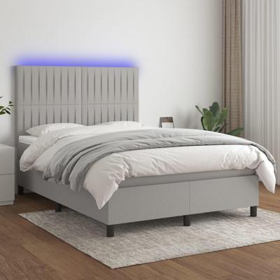 Boxspring met matras en LED stof lichtgrijs 140x190 cm
