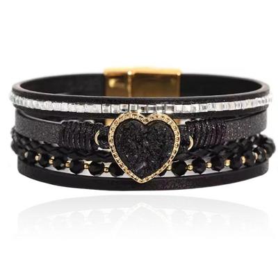 Deja Armband goudkleurig met hartvormige natuursteen in zwart