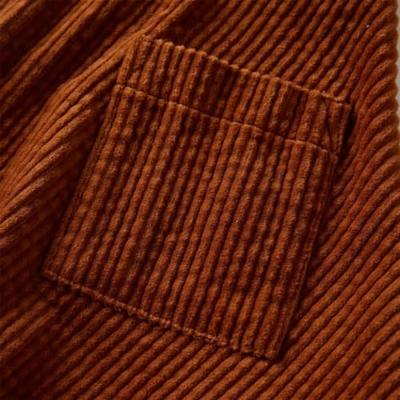 Kinderrok met zakken ribfluweel 92 cognackleurig Kinderrok met zakken ribfluweel 92 cognackleurig