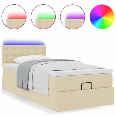 Ottoman bed met matras en LED's 160x200cm stof crèmekleurig