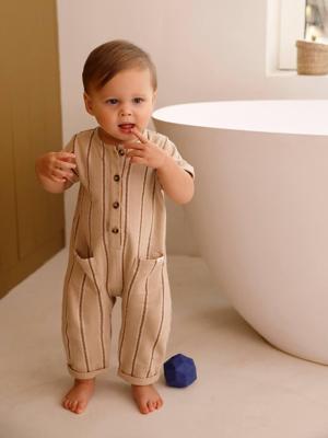 Gestreepte gebreide babyromper zandbeige