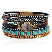 Deja Boho Armband goudkleurig met turquoise kralen en kruis natuursteen in zwart met print - thumbnail