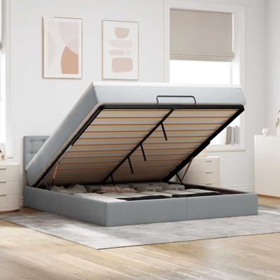 Ottoman bed met matras en LED's 120x190 cm stof lichtgrijs