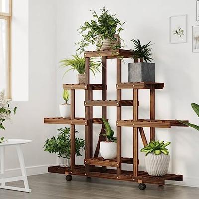 Plantenstandaard met wielen 110x25x101 cm massief vurenhout