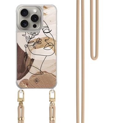 iPhone 15 Pro hoesje met beige koord - Abstract gezicht bruin iPhone 15 Pro hoesje met beige koord - Abstract gezicht bruin
