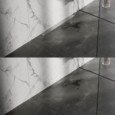 Douchegoot Brauer Geborsteld RVS Muur Montage Inclusief Vloerflens 80x7 cm Zero Tegelinlegrooster Omkeerbaar Brauer Douchegoot Brauer Geborsteld RVS Muur Montage Inclusief Vloerflens 80x7 cm Zero Tegelinlegrooster Omkeerbaar Brauer