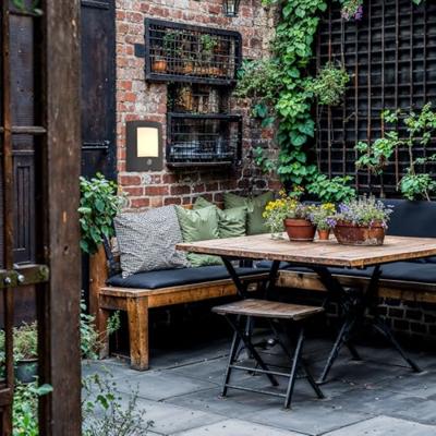 QAZQA Buitenwandlamp antraciet met bewegingssensor IP44 - Emmerald 1