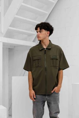 Malelions Capri Zip T-Shirt Heren Donkergroen - Maat L - Kleur: Donkergroen | Soccerfanshop