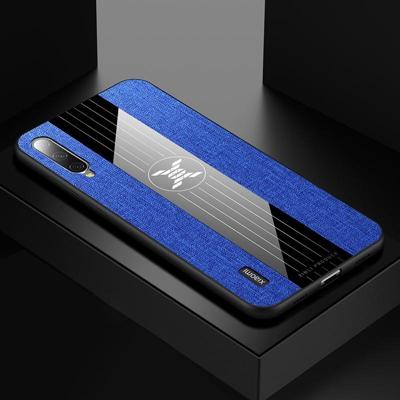 Voor Xiaomi mi CC9e XINLI stiksels doek textuur schokbestendig TPU beschermhoes (blauw)