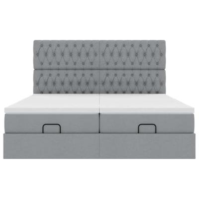 Ottoman bed met matrassen en LED's 180x200cm stof lichtgrijs