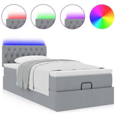Ottoman bed met matras en LED's 100x200 cm stof lichtgrijs