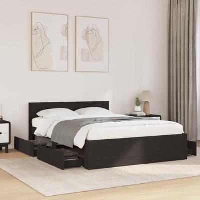 Bedframe met hoofdeinde zonder matras 140x200 cm zwart