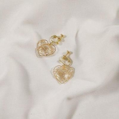 Vrouwen Vintage holle ster hart Tangle line Earring (korte hart oor clip)