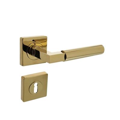 Deurkruk Baustil op vierkante rozet met nokken 55x55x10mm en sleutelplaatjes PVD messingkleur