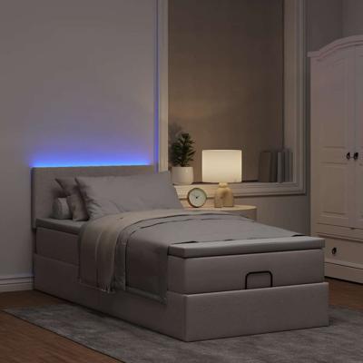 Ottoman bed met matras en LED's 120x200cm stof taupe