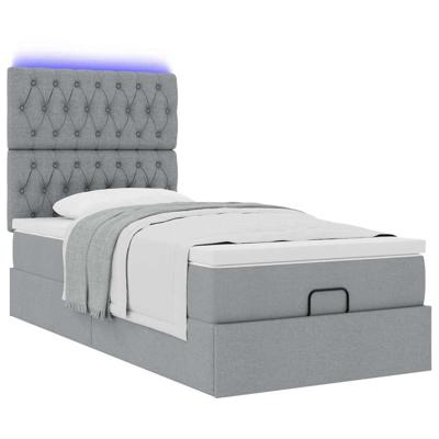 Ottoman bed met matras en LED's 90x190cm stof lichtgrijs