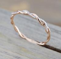 Vrouw klassieke Cubic Zirconia twist vorm ring kleur: Rose goud (10) - thumbnail