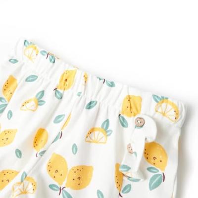 Kindershorts citroenenprint 128 ecru