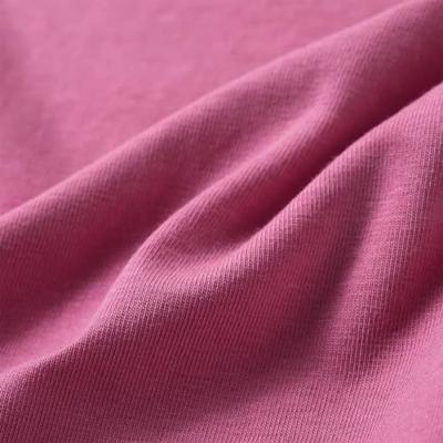 Kindershirt lange mouwen met woord in pailletten 104 frambozenkleur - thumbnail