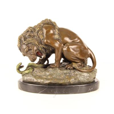 A BRONZE SCULPTURE OF A LION AND SERPENT