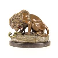 A BRONZE SCULPTURE OF A LION AND SERPENT - thumbnail