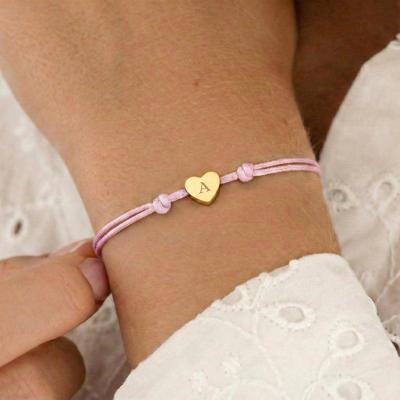 Gepersonaliseerde koord armband - Roze - Gouden hartje