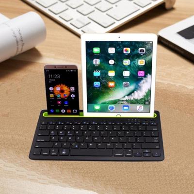 B908 Ultra-slanke 78 toetsen Bluetooth draadloos toetsenbord met holle GSM houder (zwart)