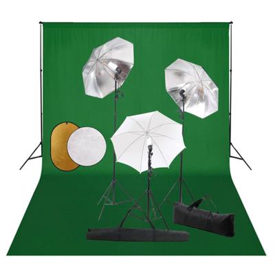 Fotostudioset met lampen, paraplu's, achtergrond en reflector