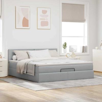 Ottoman bed met matras en LED's 90x190cm stof lichtgrijs
