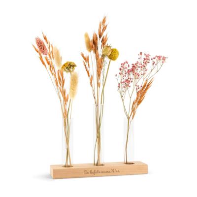 Droogbloemen in gepersonaliseerde houder met drie vaasjes