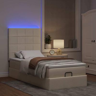 Ottoman bed met matras en LED's 120x190cm stof crèmekleurig