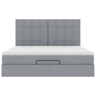 Ottoman bed met matras en LED's 180x200cm stof lichtgrijs
