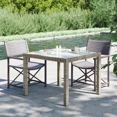 Tuintafel 150x90x75 cm gehard glas en poly rattan grijs