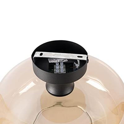 QAZQA Art deco plafondlamp zwart met amber glas - Bizle
