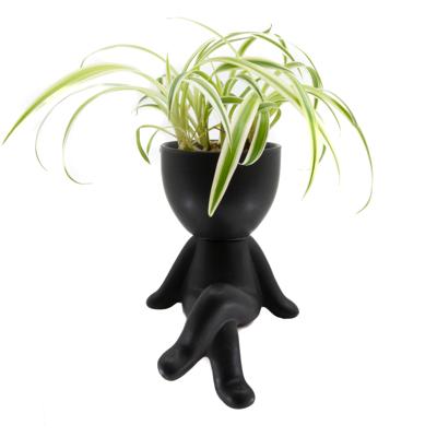 Bloempot Mannetje Benen Gekruist Zwart