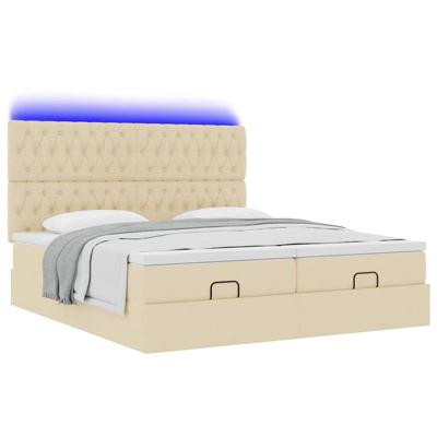 Ottoman bed met matrassen en LED's 180x200cm stof crèmekleurig
