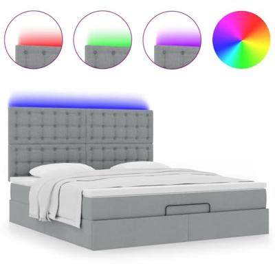 Ottoman bed met matras en LED's 180x200cm stof lichtgrijs