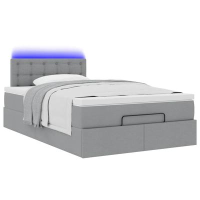 Ottoman bed met matras en LED's 120x200 cm stof lichtgrijs