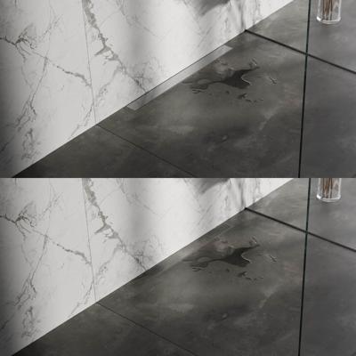 Douchegoot Brauer Geborsteld RVS Muur Montage Inclusief Vloerflens 80x7 cm Zero Tegelinlegrooster Omkeerbaar Brauer Douchegoot Brauer Geborsteld RVS Muur Montage Inclusief Vloerflens 80x7 cm Zero Tegelinlegrooster Omkeerbaar Brauer