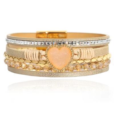 Deja Armband goudkleurig met hartvormige natuursteen in beige