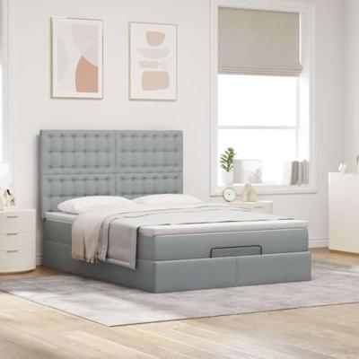 Ottoman bed met matras en LED's 140x200cm stof lichtgrijs
