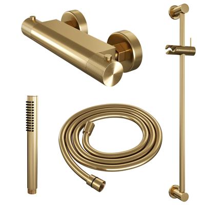 Gold Carving douche thermostaatkraan set met glijstang, handdouche en doucheslang in goud geborsteld PVD