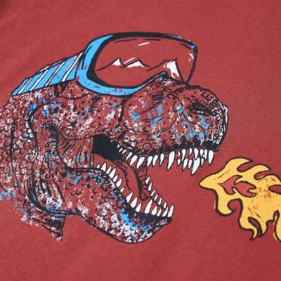 Kindershirt met lange mouwen dinosaurusprint 92 roodbruin Kindershirt met lange mouwen dinosaurusprint 92 roodbruin