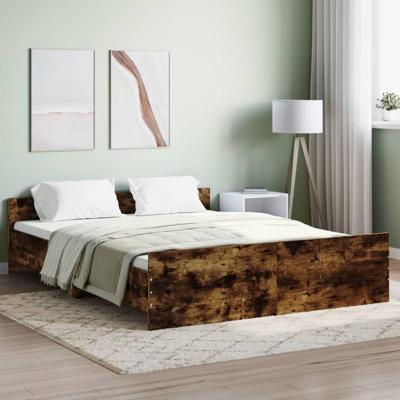 Bedframe met hoofd- en voeteneinde gerookt eiken 160x200 cm