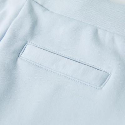 Kinderjoggingbroek 128 lichtblauw