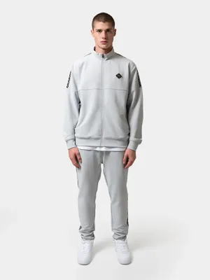 XPLCT Creator Trainingspak Heren Grijs - Maat M - Kleur: Lichtgrijs | Soccerfanshop