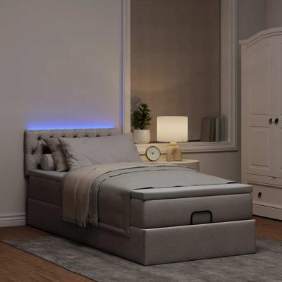 Ottoman bed met matras en LED's 100x200 cm stof taupe