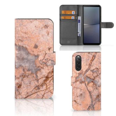 Sony Xperia 10 V | Bookcase | Marmer Oranje