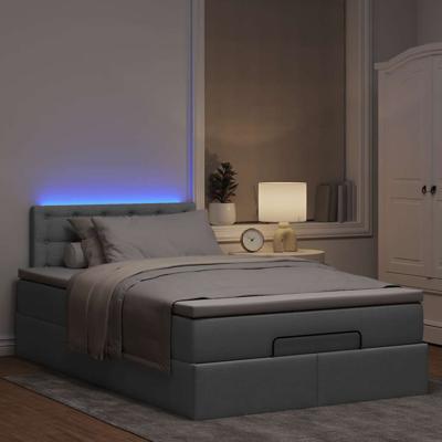 Ottoman bed met matras en LED's 120x200 cm stof lichtgrijs - thumbnail